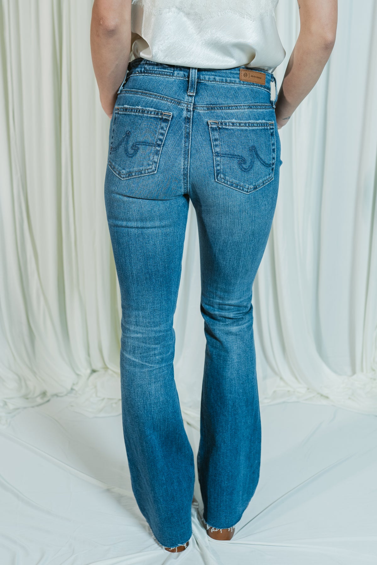 Farrah Favorite Mid Rise Bootcut Jeans W/ Raw Hem