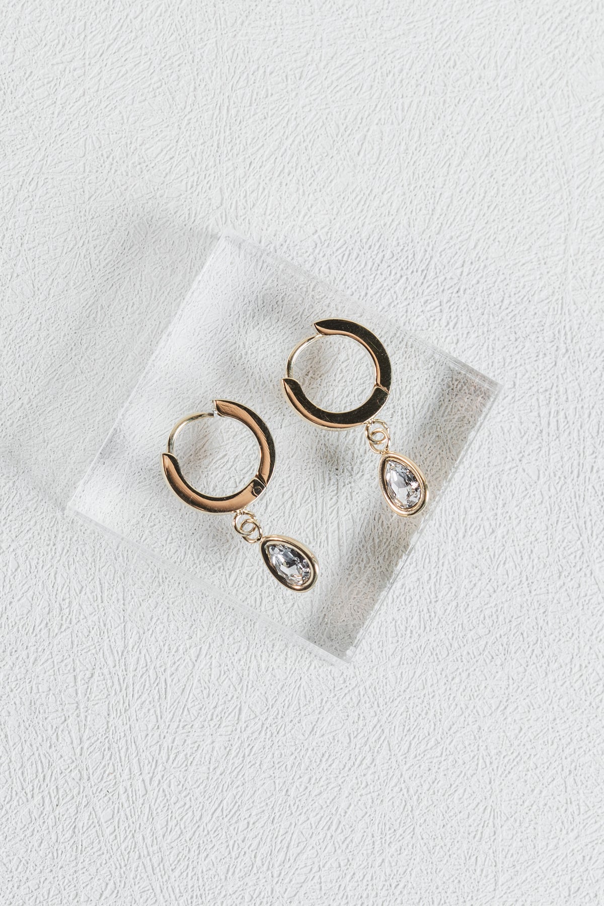 Oval Bezel Huggie Earring