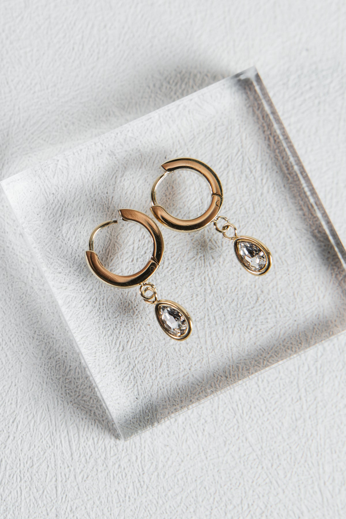 Oval Bezel Huggie Earring