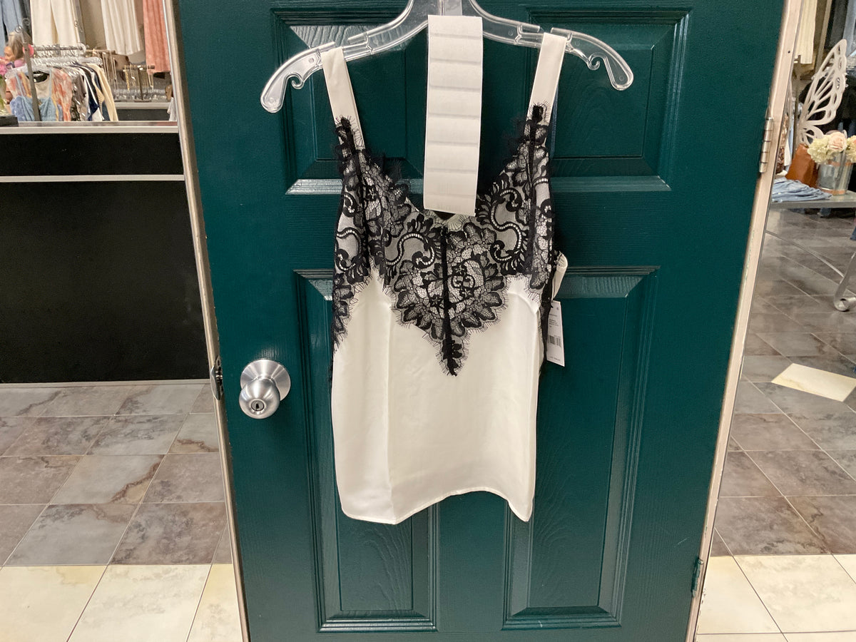 The Dressy Sleeveless Lace Blouse